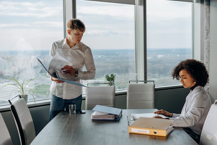 Man And Woman Working In The Office