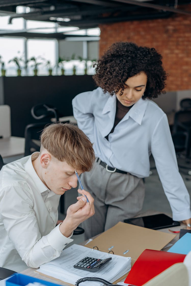 Man And Woman Working In The Office