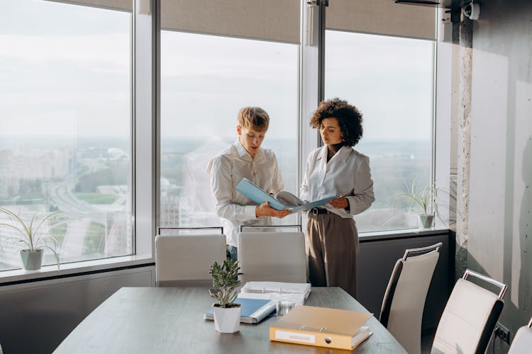 Man And Woman Working In The Office
