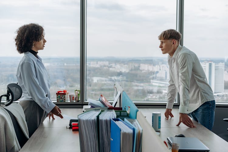 Man And Woman Working In The Office