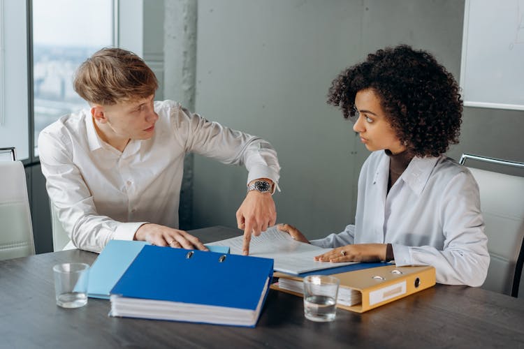 Man And Woman Working In The Office