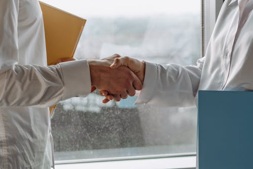 Free Business People Shaking Hands Stock Photo