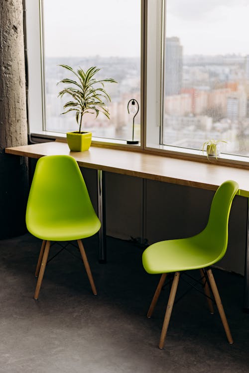Free Green Chairs Beside Wooden Table Stock Photo