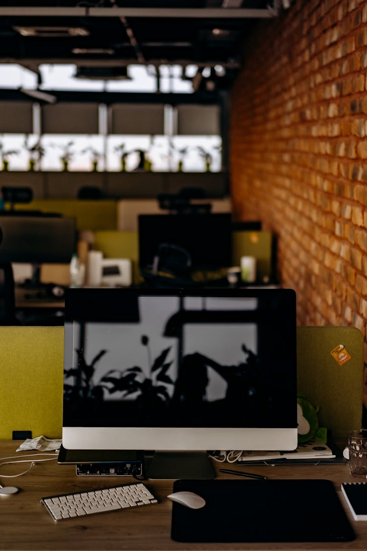 A Computer On An Office Desk