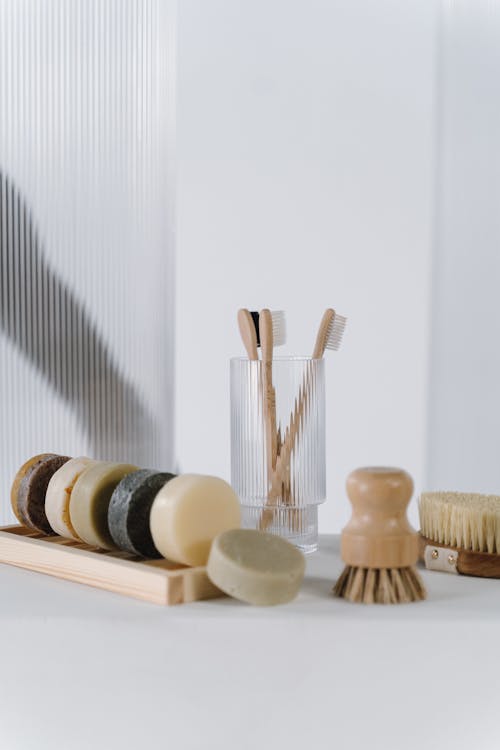 Free Brushes and Soap on White Surface Stock Photo