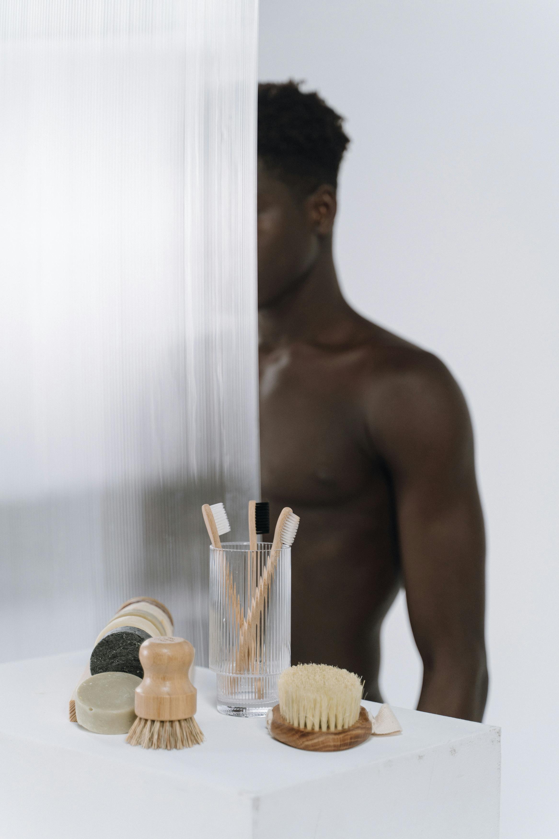A modern bathroom setup featuring body brushes and natural hygiene essentials.