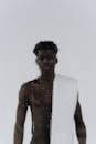 Shirtless Man with a White Towel on his Shoulder