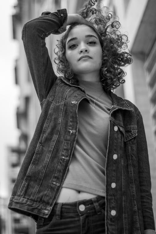 Free Grayscale Photo of Woman in Denim Jacket Stock Photo