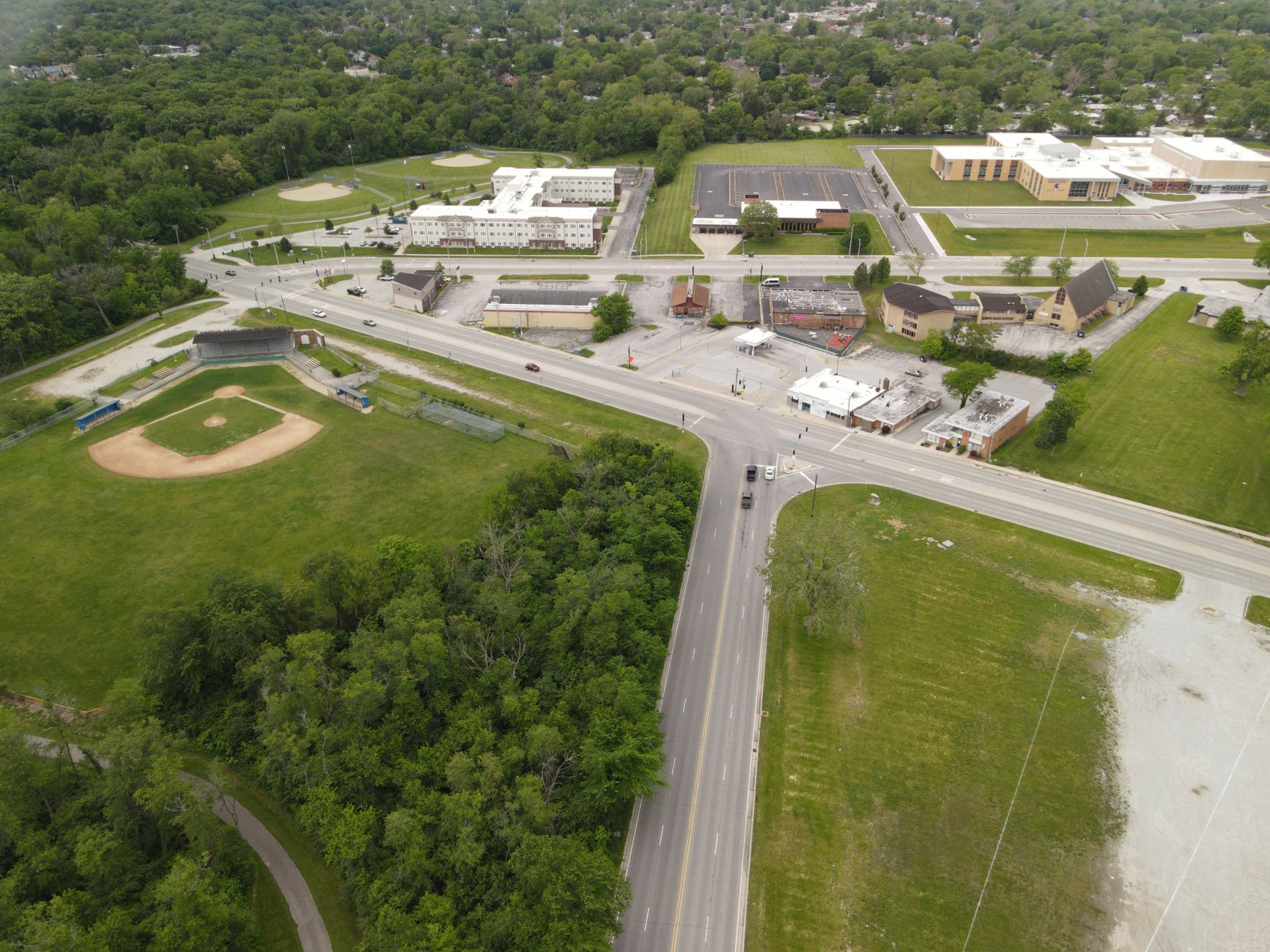 Aerial view of a road intersection, baseball field, and buildings in Chicago Heights, Illinois.