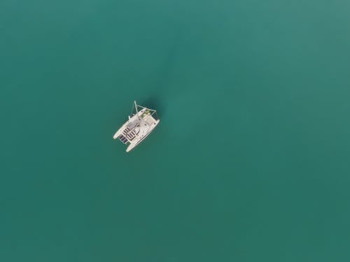 Foto profissional grátis de aerofotografia, barco, de cima