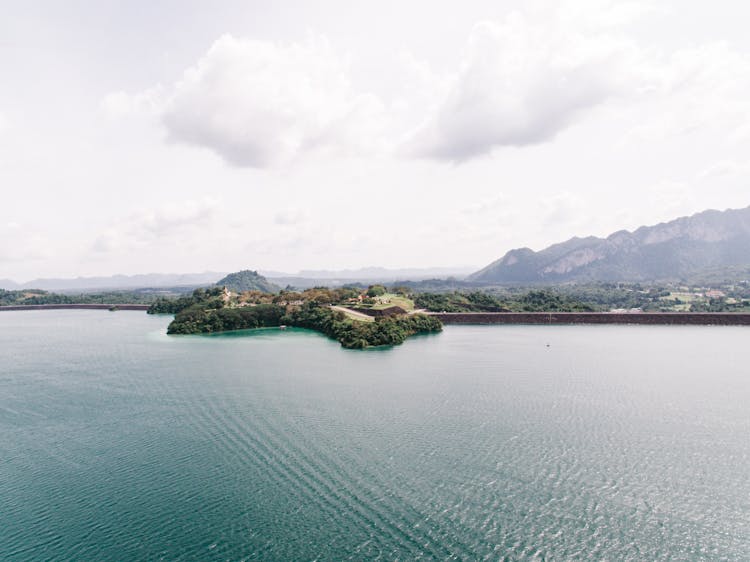 High Angle View Of A Lake And Mountains And Trees On The Lakeshore