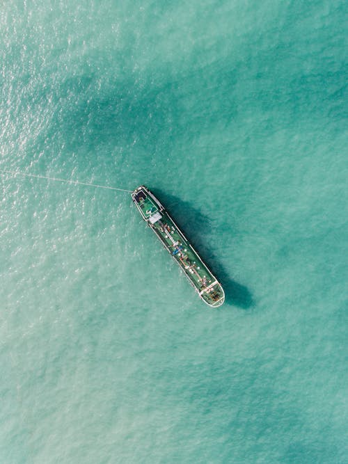 Free An Aerial Photography of a Sailing Boat on the Sea Stock Photo
