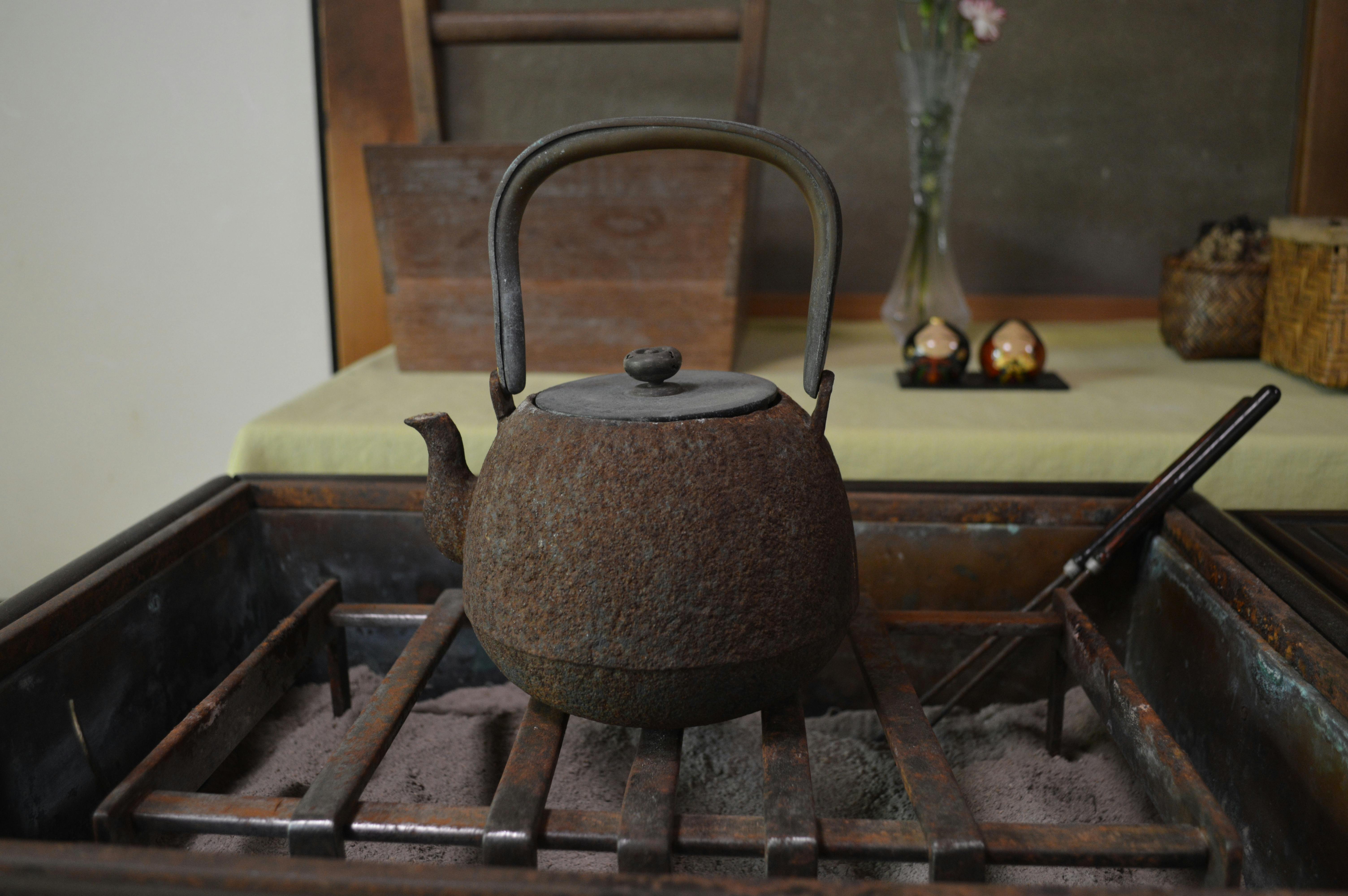 Photo of a Rusty Kettle on the Grill · Free Stock Photo