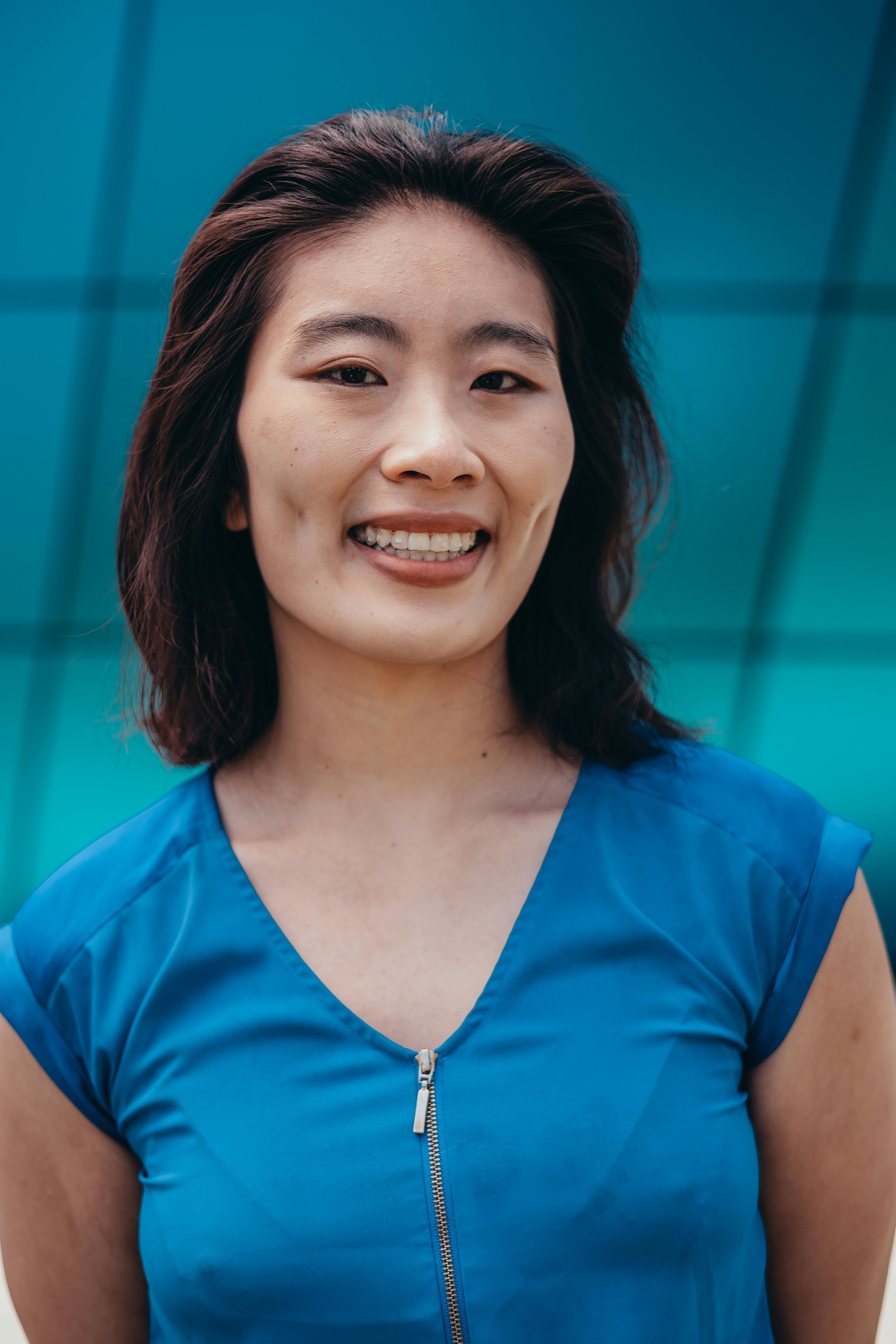 portrait of a woman wearing a blue top