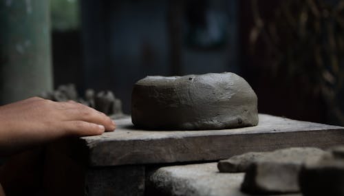 Hand and Clay Form