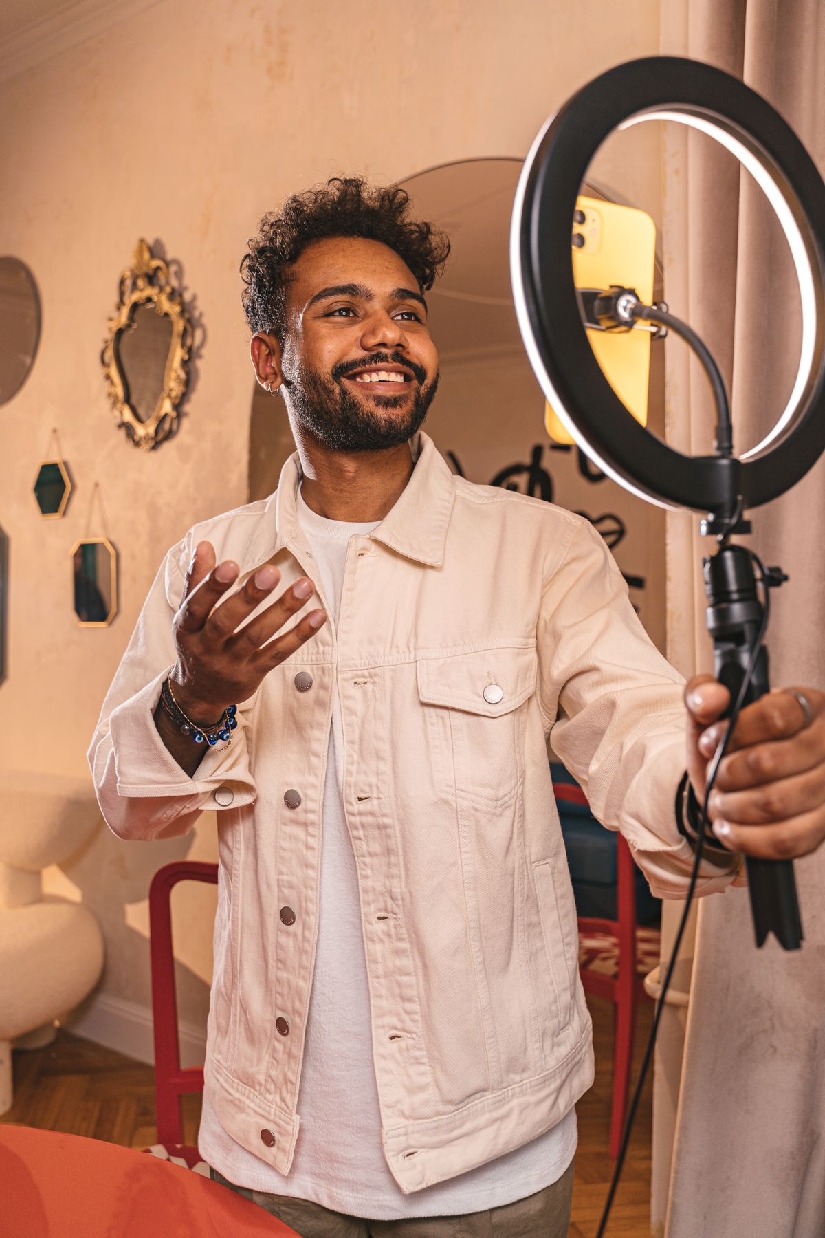 Content creator filming brand content with a smartphone gimbal in Hatta, Dubai