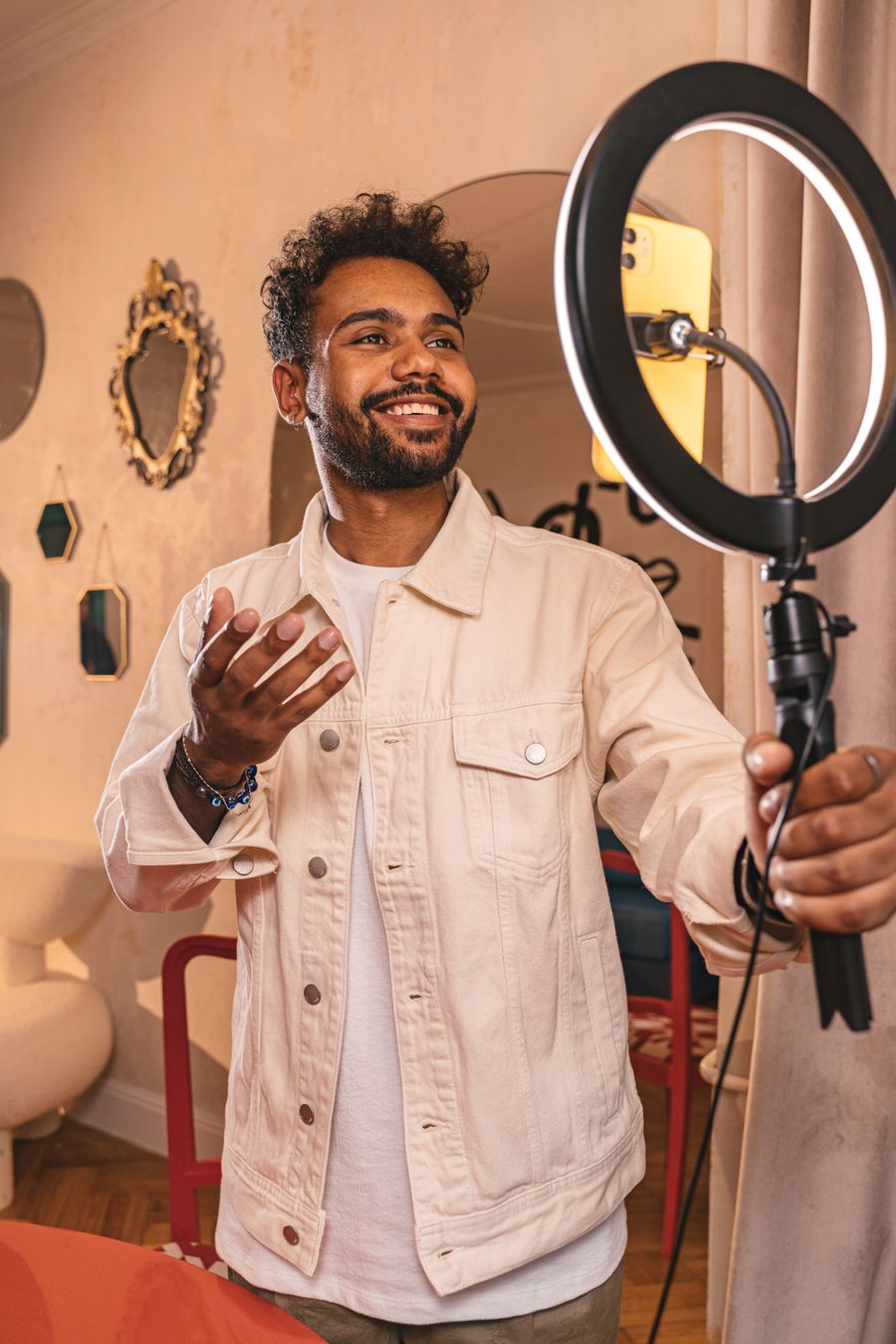 Content creator filming brand content with a smartphone gimbal in Hatta, Dubai