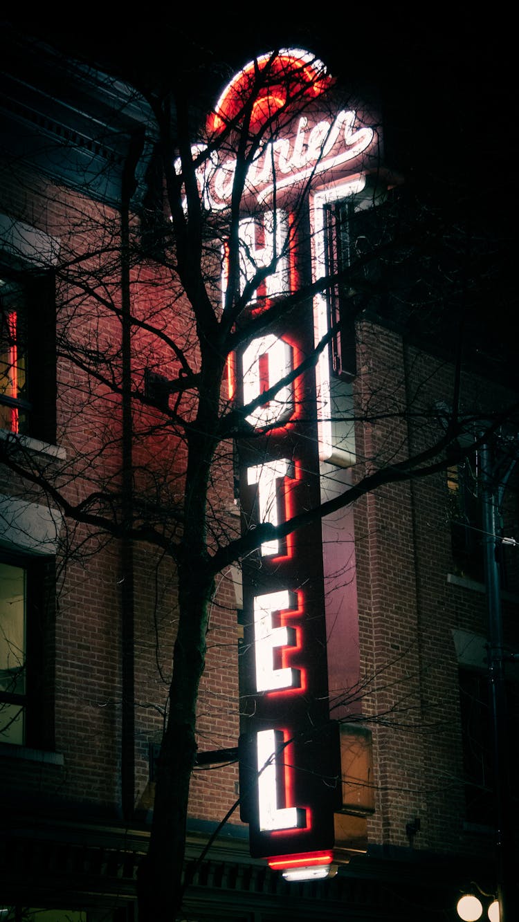 Close-up Of Neon Hotel Sign At Night