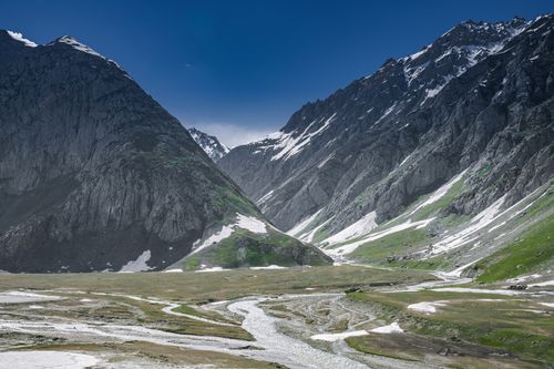 Free Breathtaking view of snow-capped mountains and winding rivers in Forest Block, showcasing the beauty of winter. Stock Photo