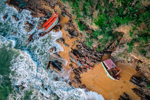 An Aerial Photography of a Beach Near the Rock Formations