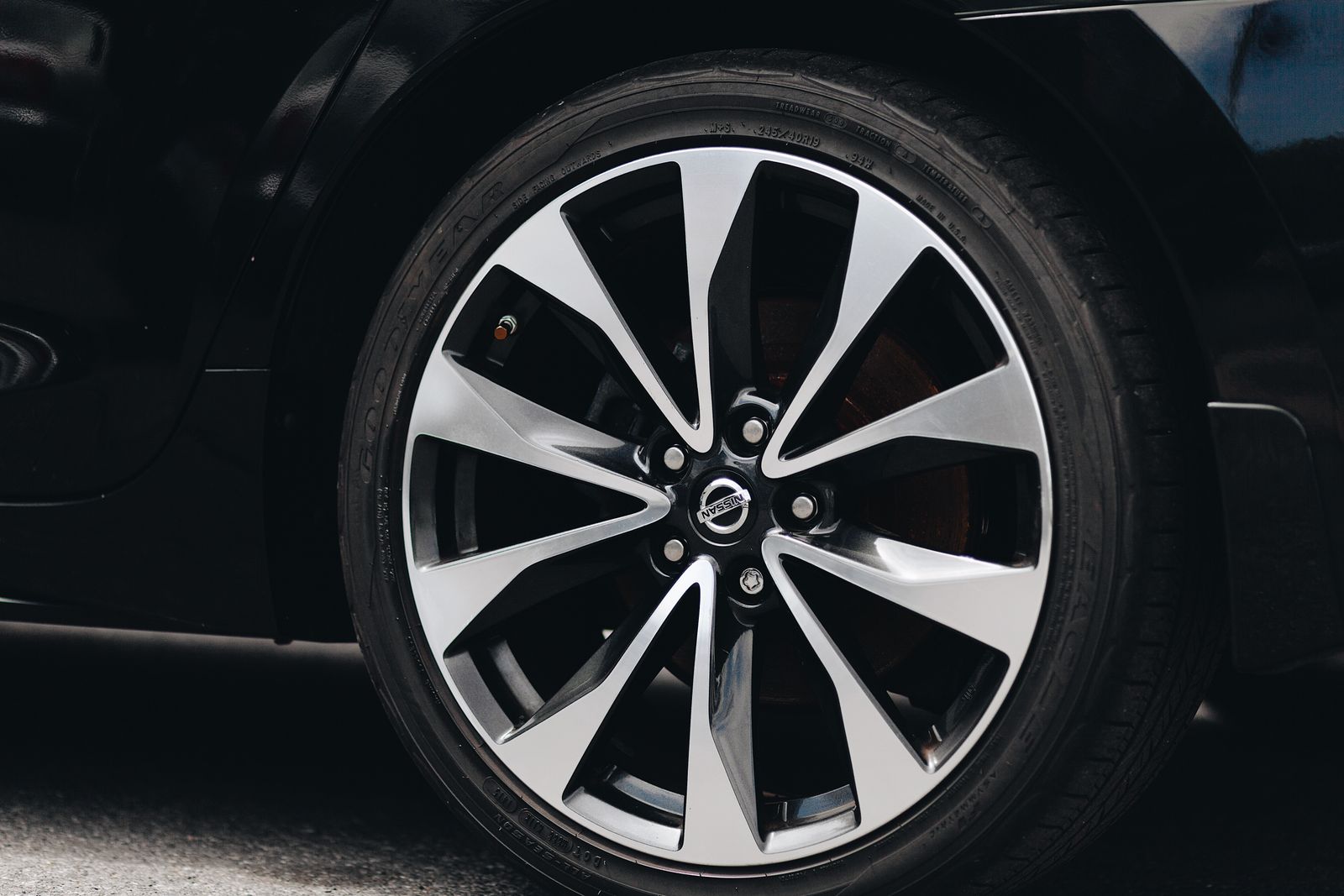 Close-up of an alloy wheel and tyre sidewall
