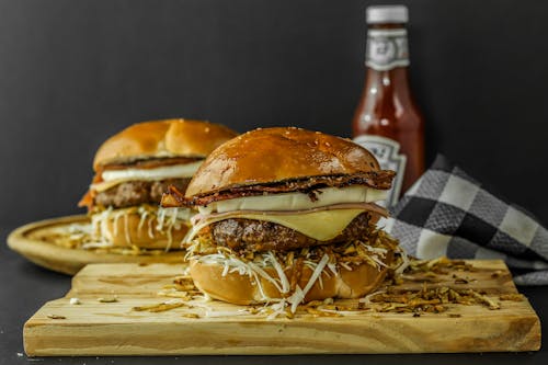 Free Burgers on Brown Wooden Boars Stock Photo