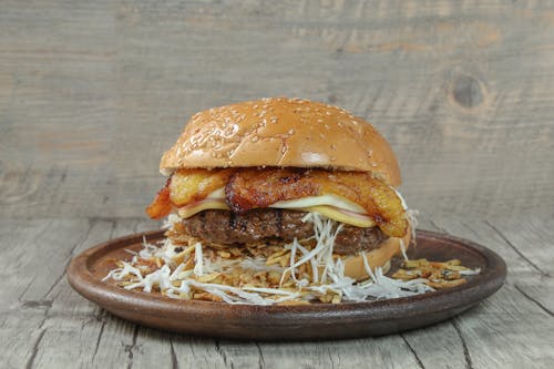 Burger on Brown Ceramic Plate