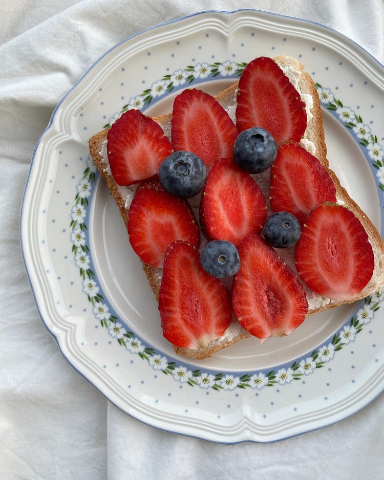 Overhead Shot Of Toast With Fruit Toppings