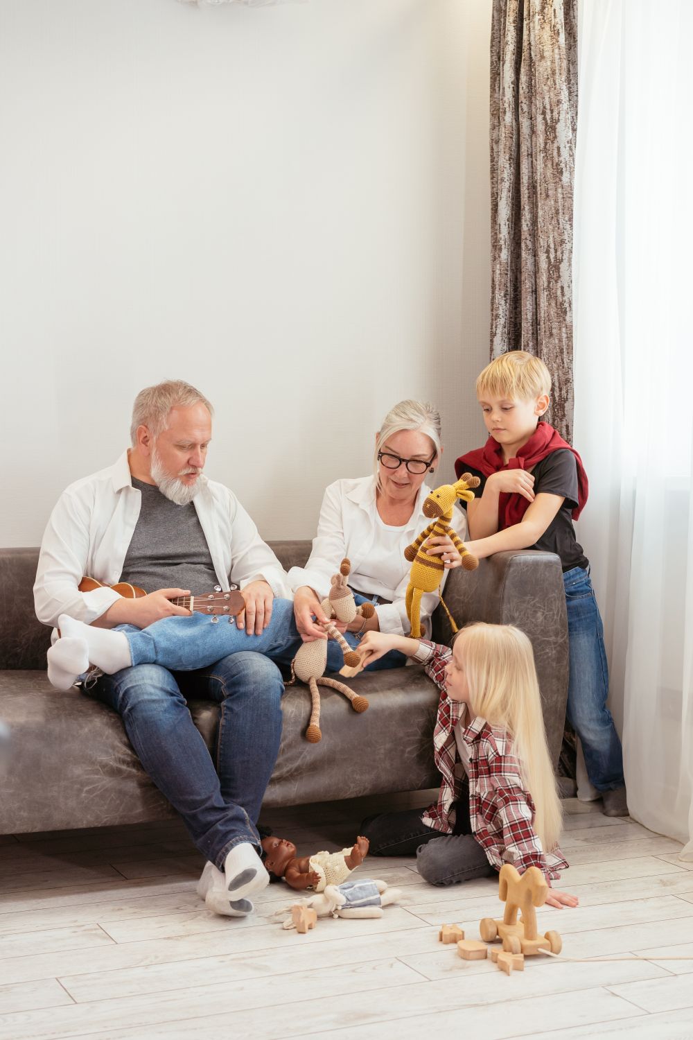 Grandparents spending time with their grandchildren, representing family and generational wealth