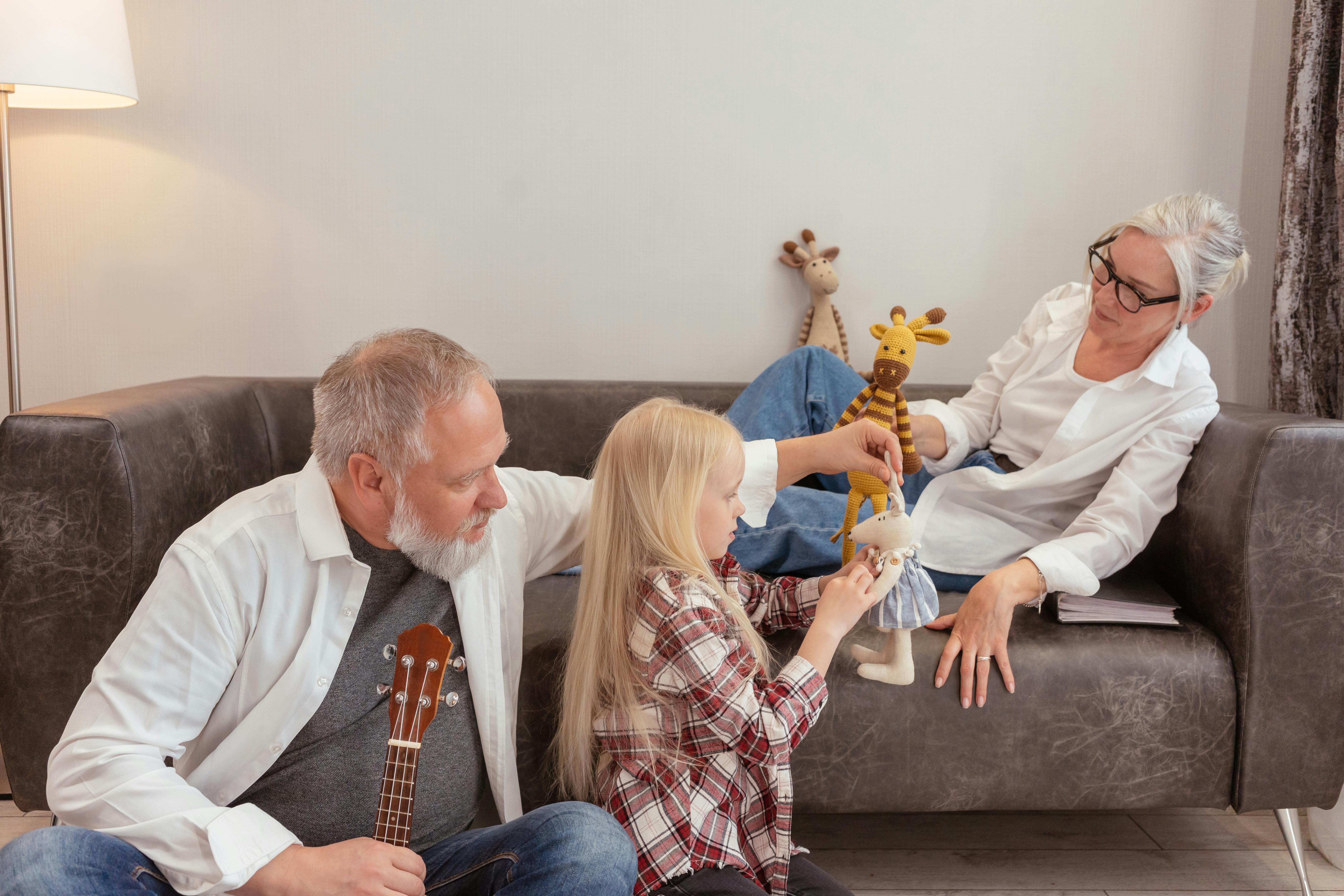 grandparents playing with girl