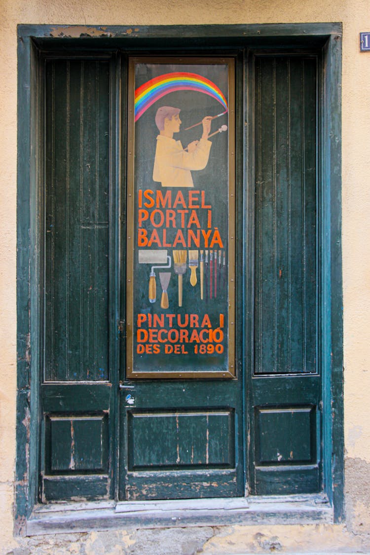 Blue Old Wooden Door With A Sign