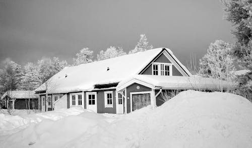 Free Monochrome Photography of Snow Capped House Stock Photo