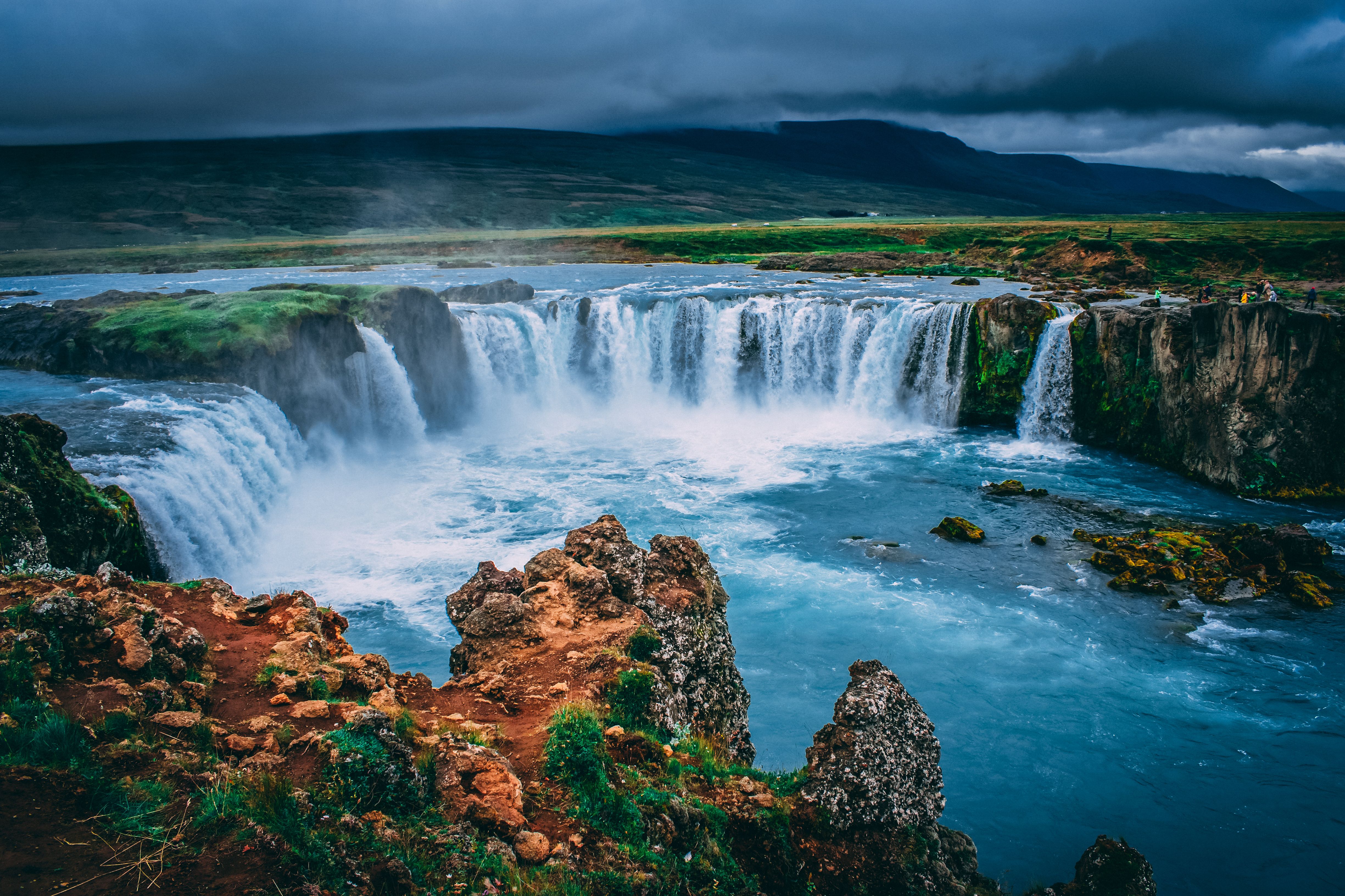 Foto profissional gratuita de gua cachoeiras cascata