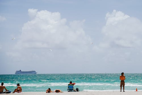 A People Having Vacation on the Beach