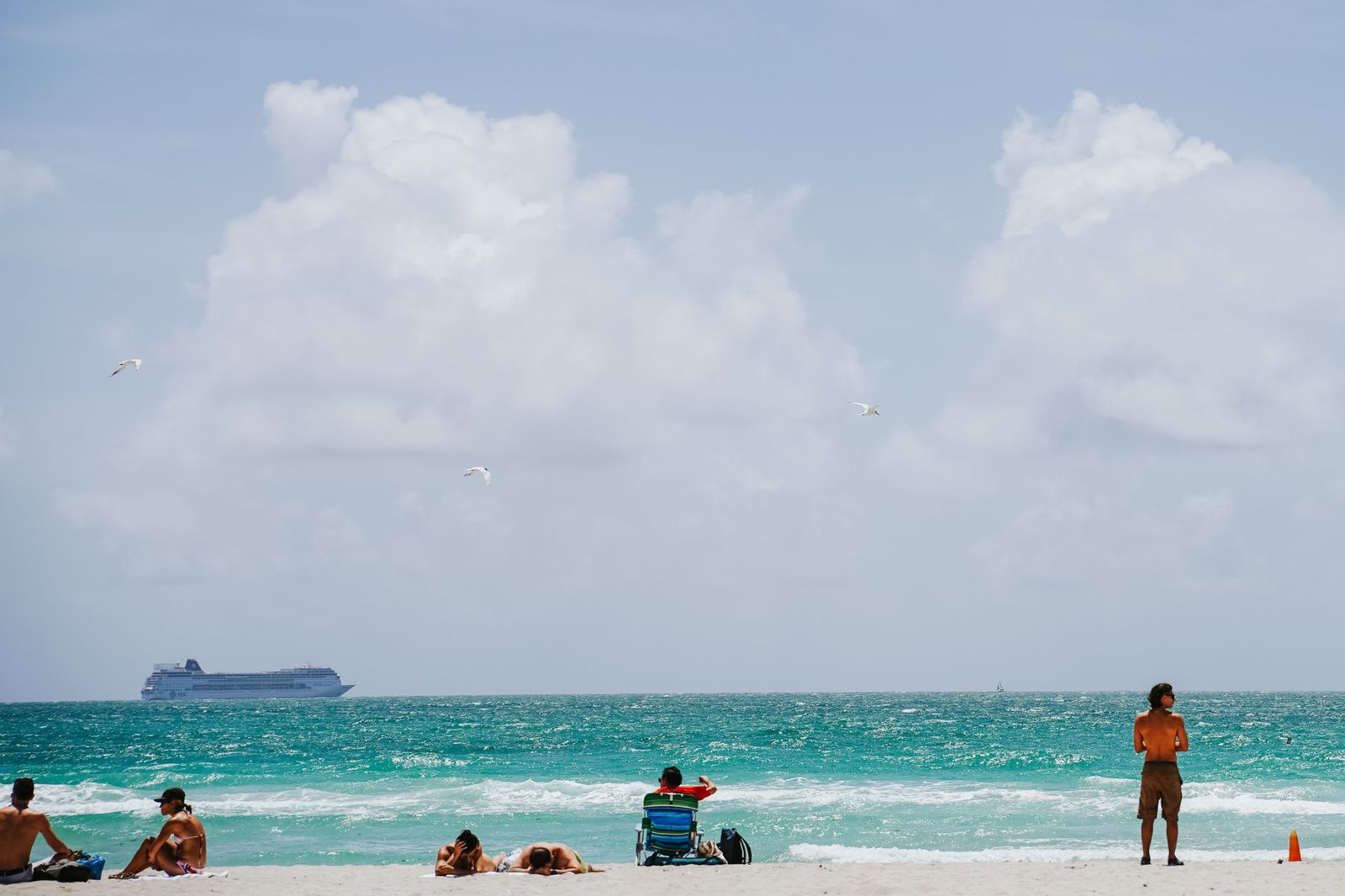 People having a beach vacation on Miami Beach