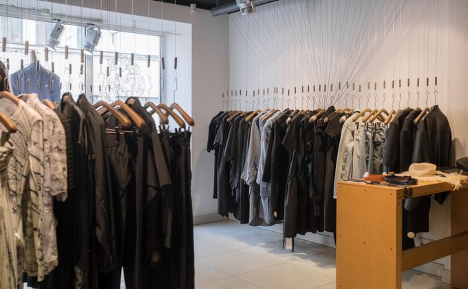 T-shirts and polos on hangers inside our Bibwewadi clothing store in Pune