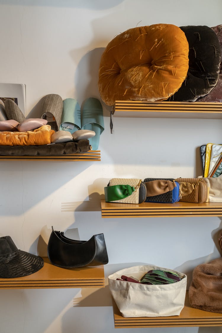 Brown Shelves With Slippers And Pouches