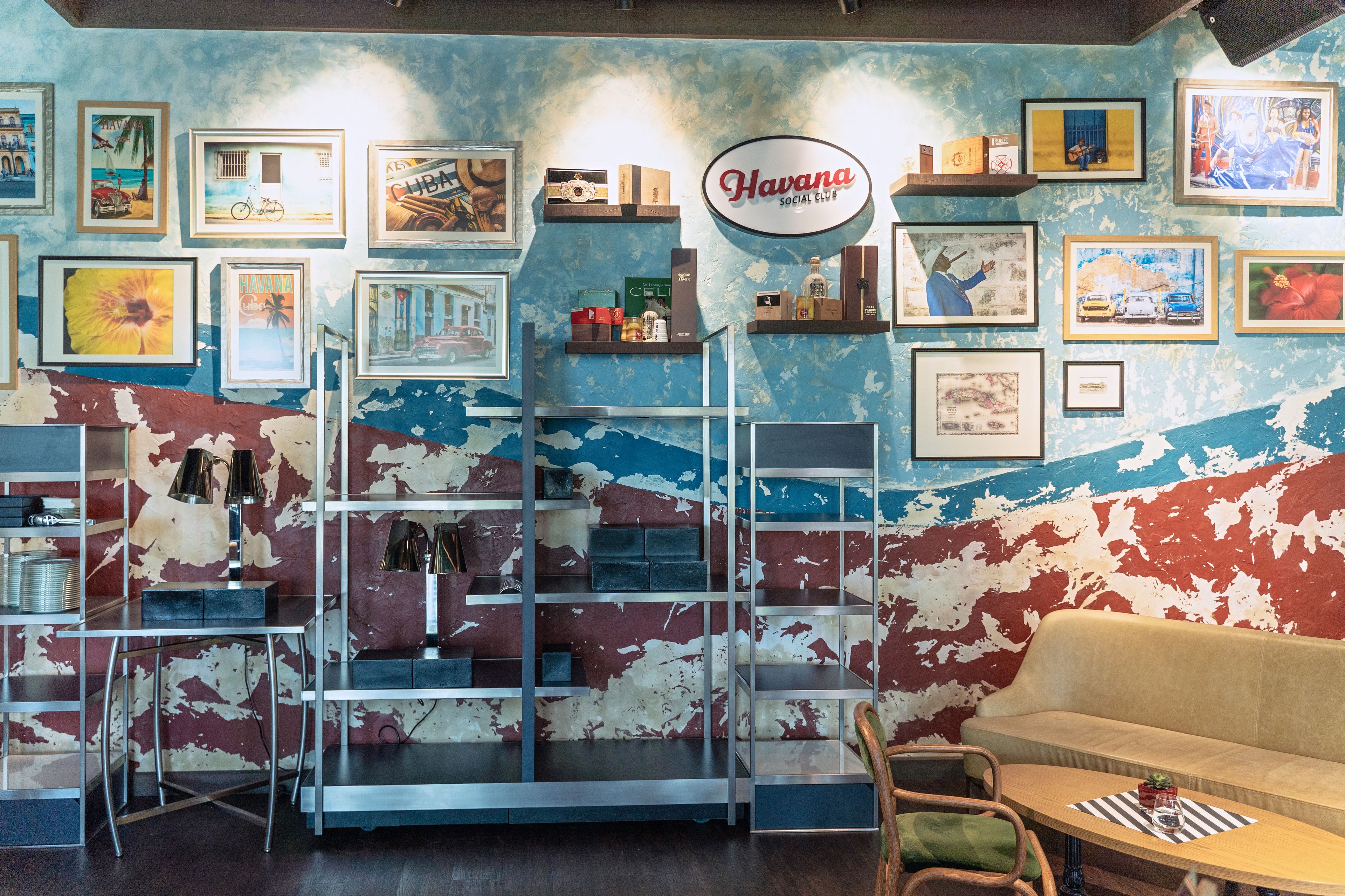 Discover a colorful Havana-themed cafe interior with retro art and decor.