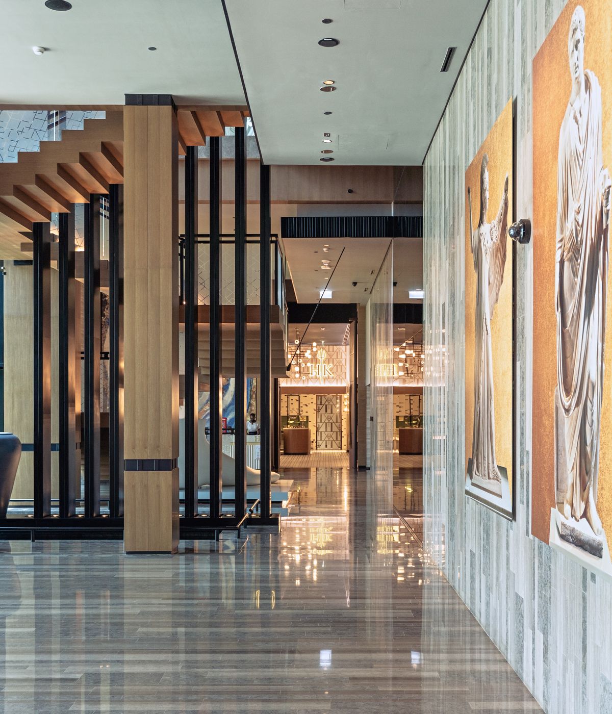 Modern hotel lobby with marble floors and elegant decor