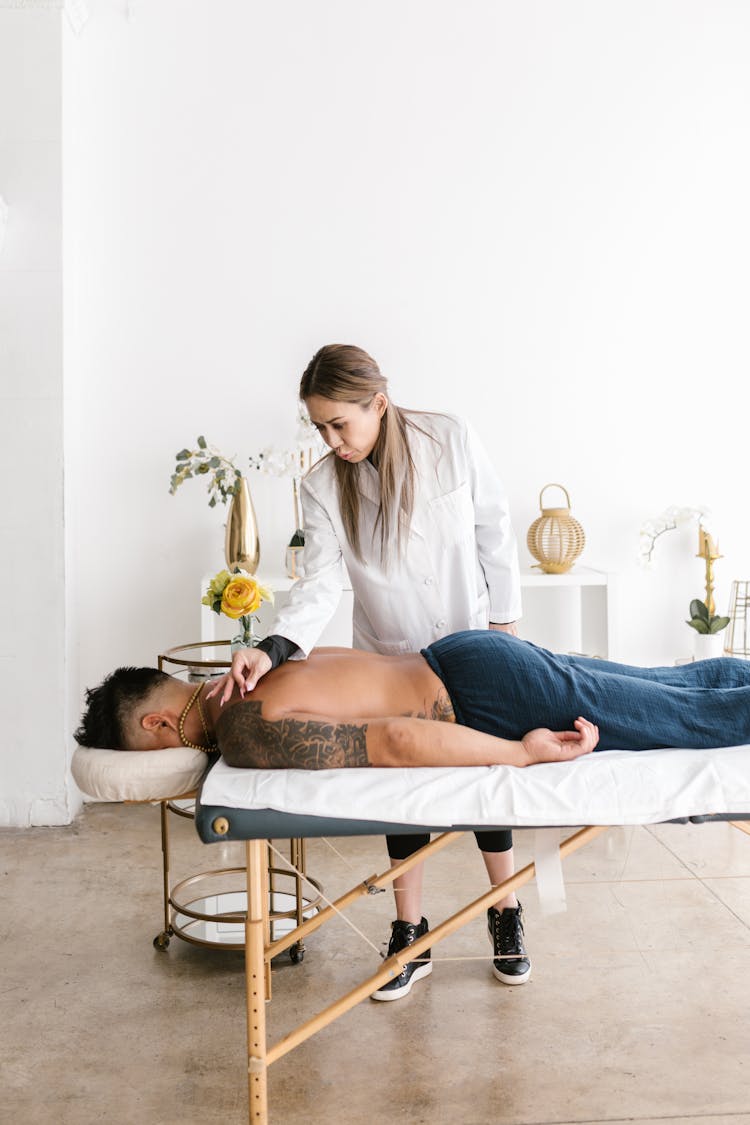 A Woman Doing Massage Therapy