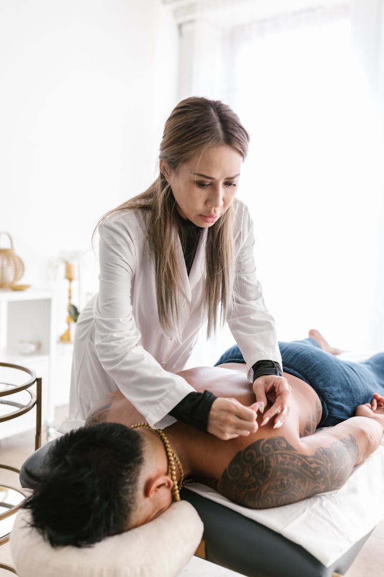 A Woman Doing Acupuncture