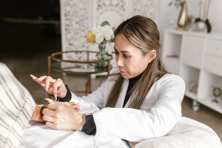 Woman Doing An Acupuncture