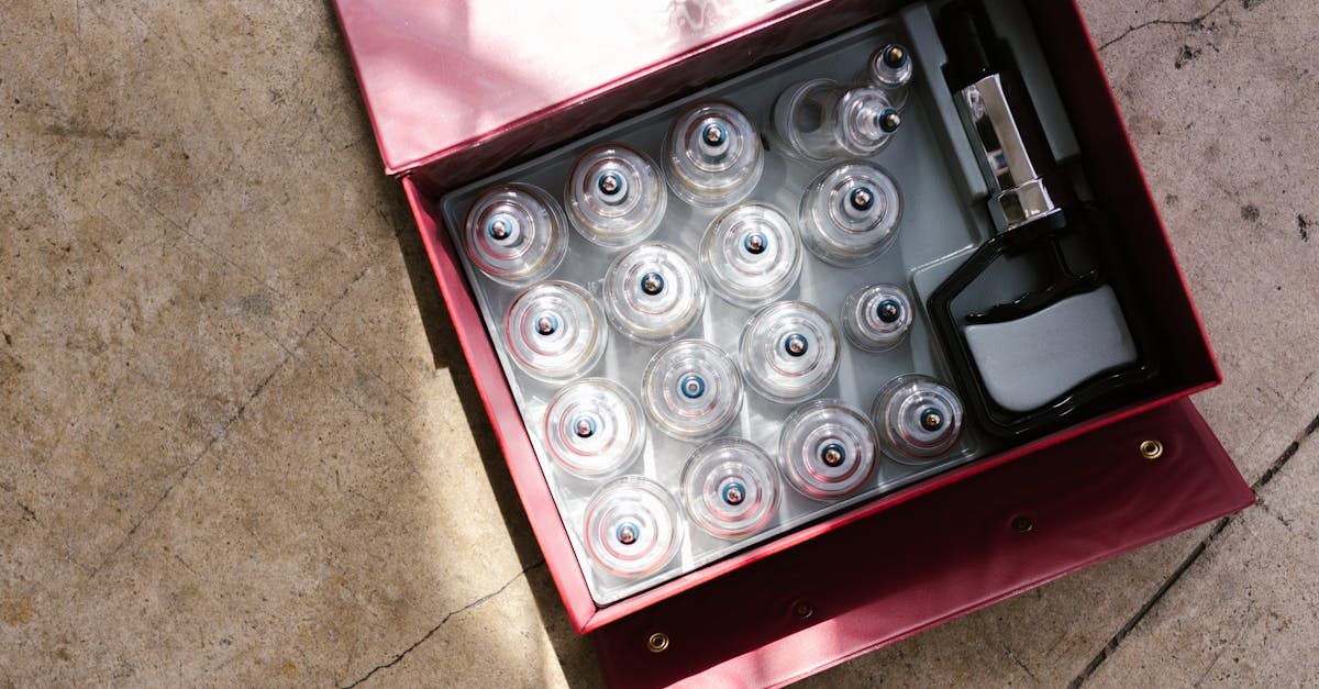 A top view of a cupping therapy set within a red box, ideal for healthcare enthusiasts.