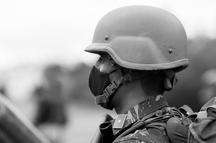 Black And White Portrait Of Soldier With Face Mask On