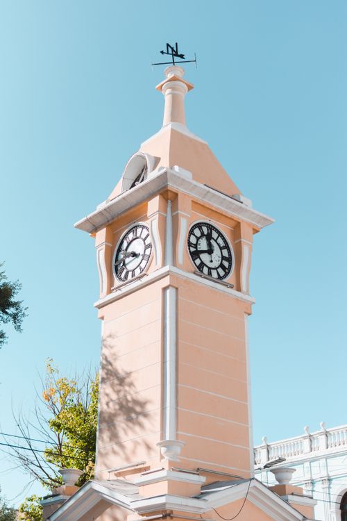 Free Captivating clock tower in Uyuni, Bolivia with clear blue sky background, showcasing historical architecture. Stock Photo
