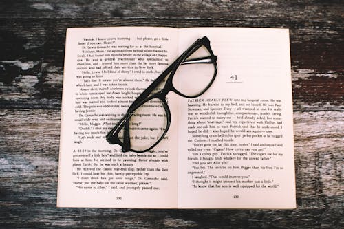 Free Photography of Eyeglasses on Top of Book Stock Photo