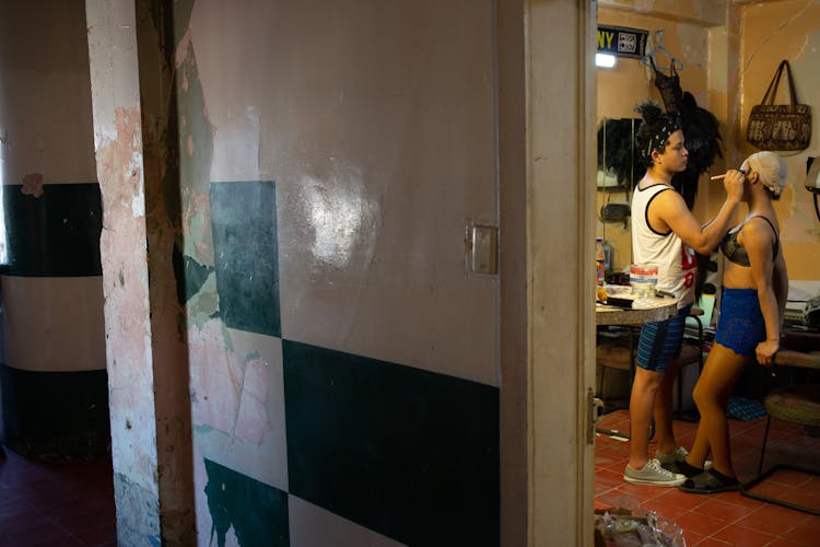 Artists Doing Makeup In Dressing Room