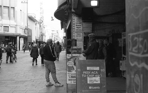 Grayscale Photo of People on the Street