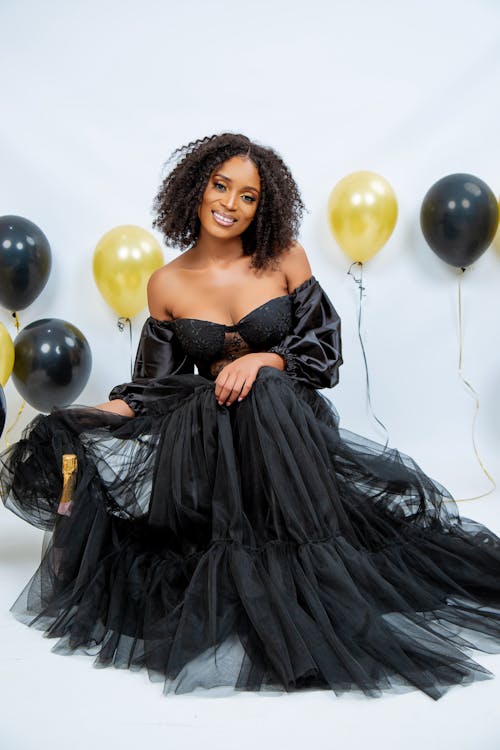 Smiling Woman in Black Dress 