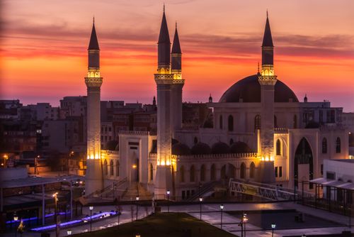 Free Beautiful illuminated mosque in Şanlıurfa at sunset with vibrant skies. Stock Photo